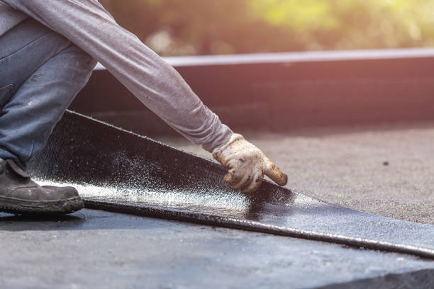 Professional Waterproofing technician working in Marion, AL